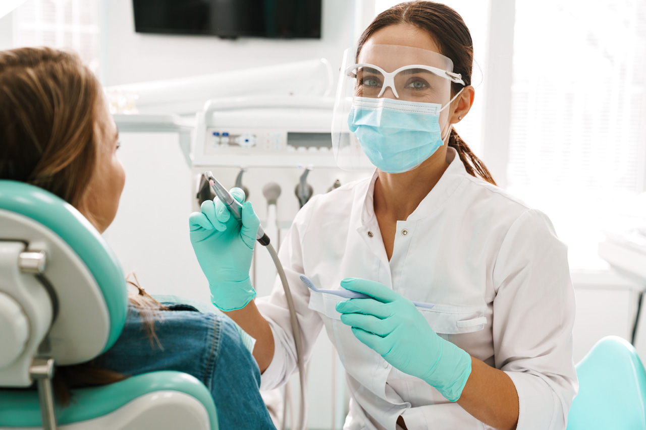 dentist working in dental clinic